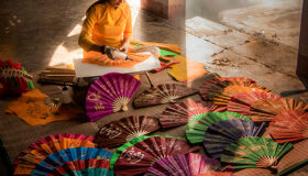 Capture the delicate artistry of Hue’s fan-making workshops